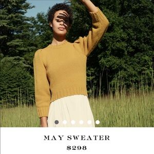 Doen May sweater in mustard color.